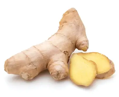 Photo of ginger root, one cut open