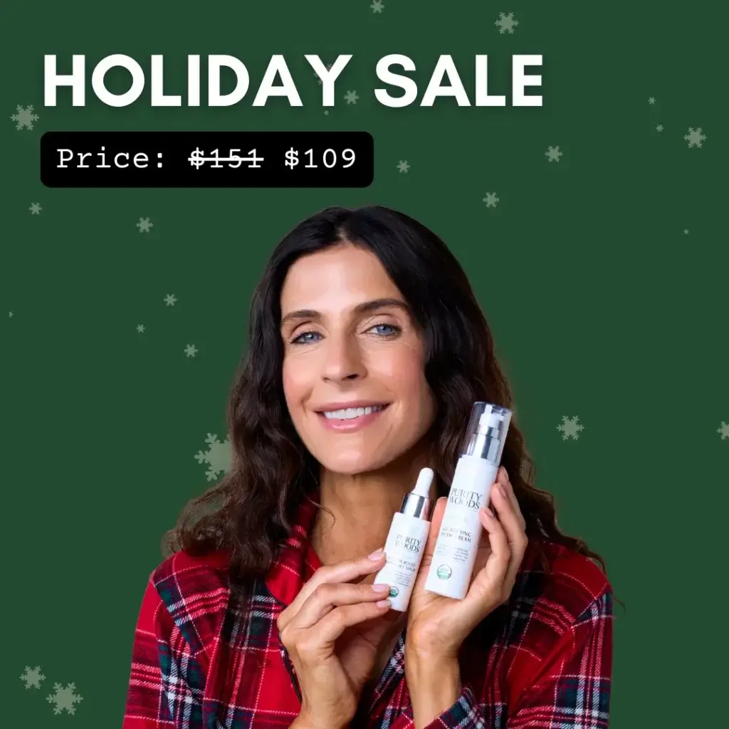 A person wearing a red plaid shirt smiles while holding two skincare products from the brand Beauty Goods. The background is green with snowflake graphics, creating a festive holiday atmosphere. Bold white text at the top reads "HOLIDAY SALE," and a black label below shows a discounted price: "Price: $109," promoting a seasonal beauty offer.
