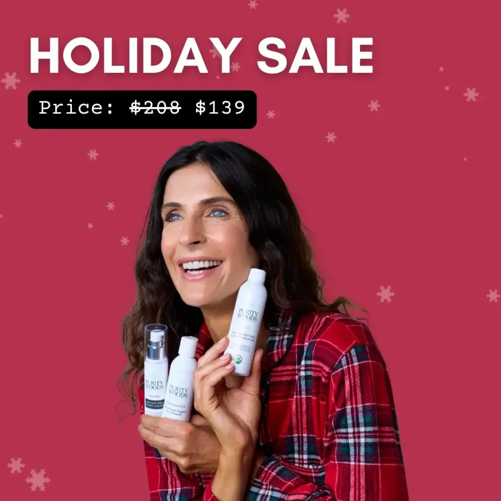 A person wearing a red plaid shirt smiles while holding four skincare products from the brand Purity Woods. The festive red background features snowflake graphics. Bold white text at the top reads "HOLIDAY SALE," and a black label below shows a discounted price: "Price: $139," highlighting a seasonal promotion.